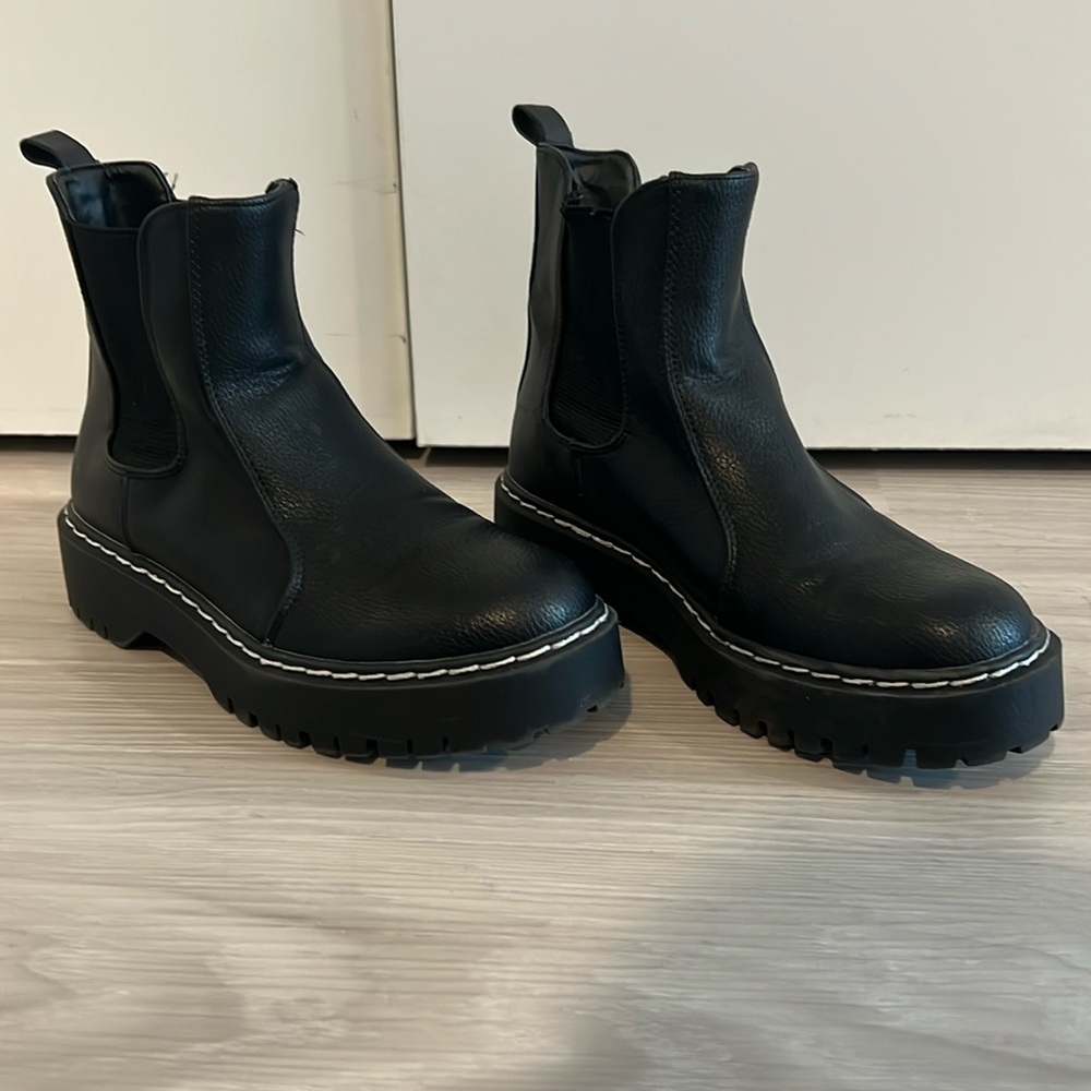 Black platform boots. Good condition.